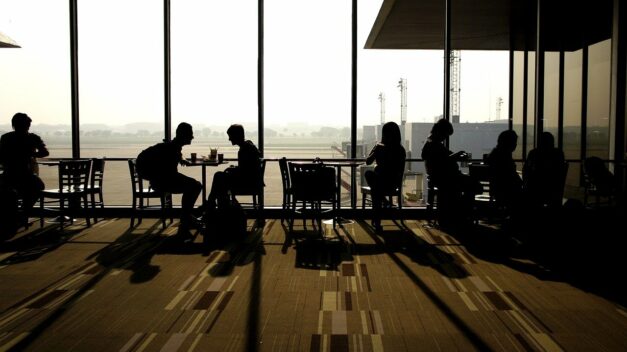 Overheard in an Airport Café